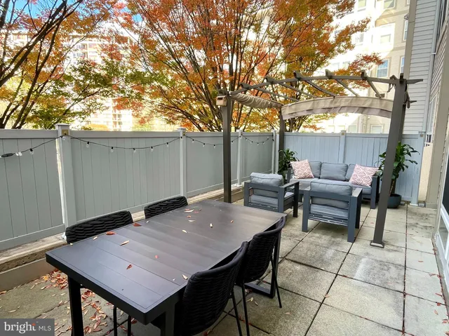 a view of a tables and chairs in patio