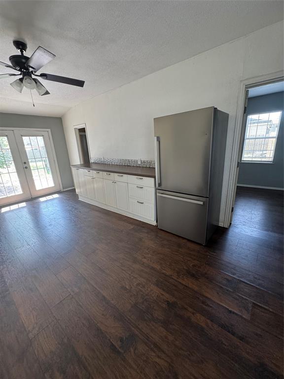 629 Harrison Lane Hurst, TX 76053 - Photo 13 of 20 wooden floor in an empty room with a window