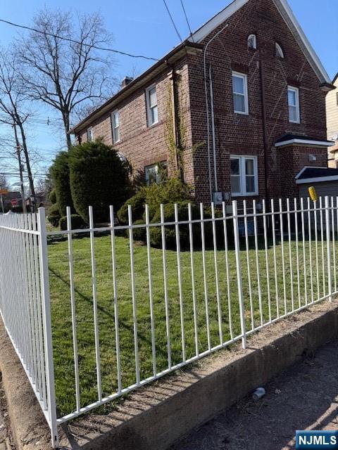 255 Bluff Road Fort Lee, NJ 07024 - Photo 2 of 14 a view of a brick house with a large window