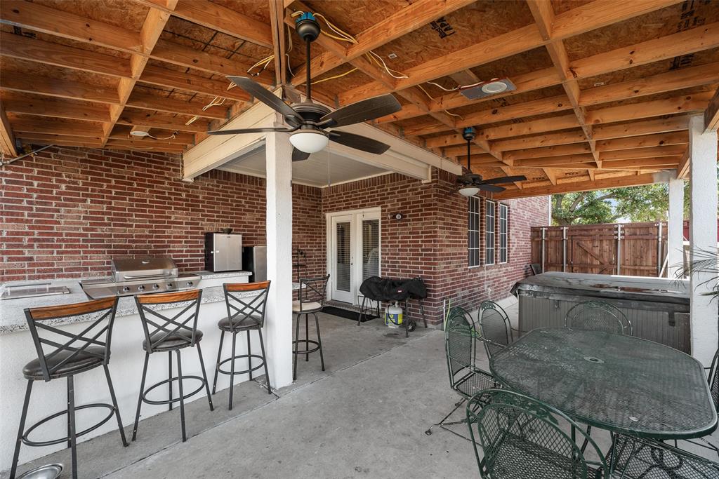 6810 Amesbury Lane Rowlett, TX 75089 - Photo 17 of 22 a patio with patio outdoor seating and patio