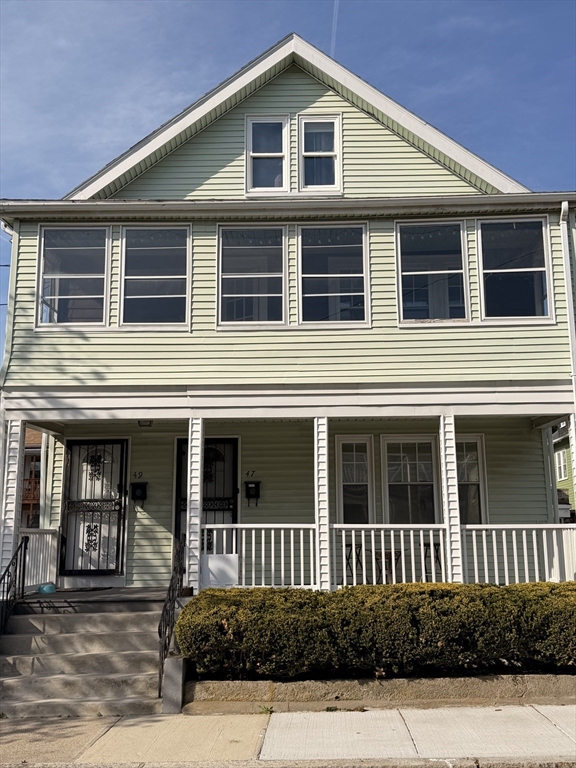 49 Sunset Road, Unit 49 Somerville, MA 02144 - Photo 2 of 24 a front view of a house