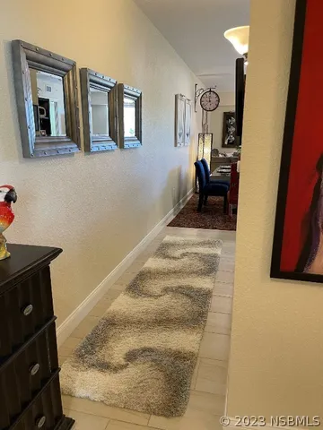 a view of fireplace with wooden floor