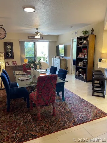 a kitchen with stainless steel appliances a refrigerator and a stove