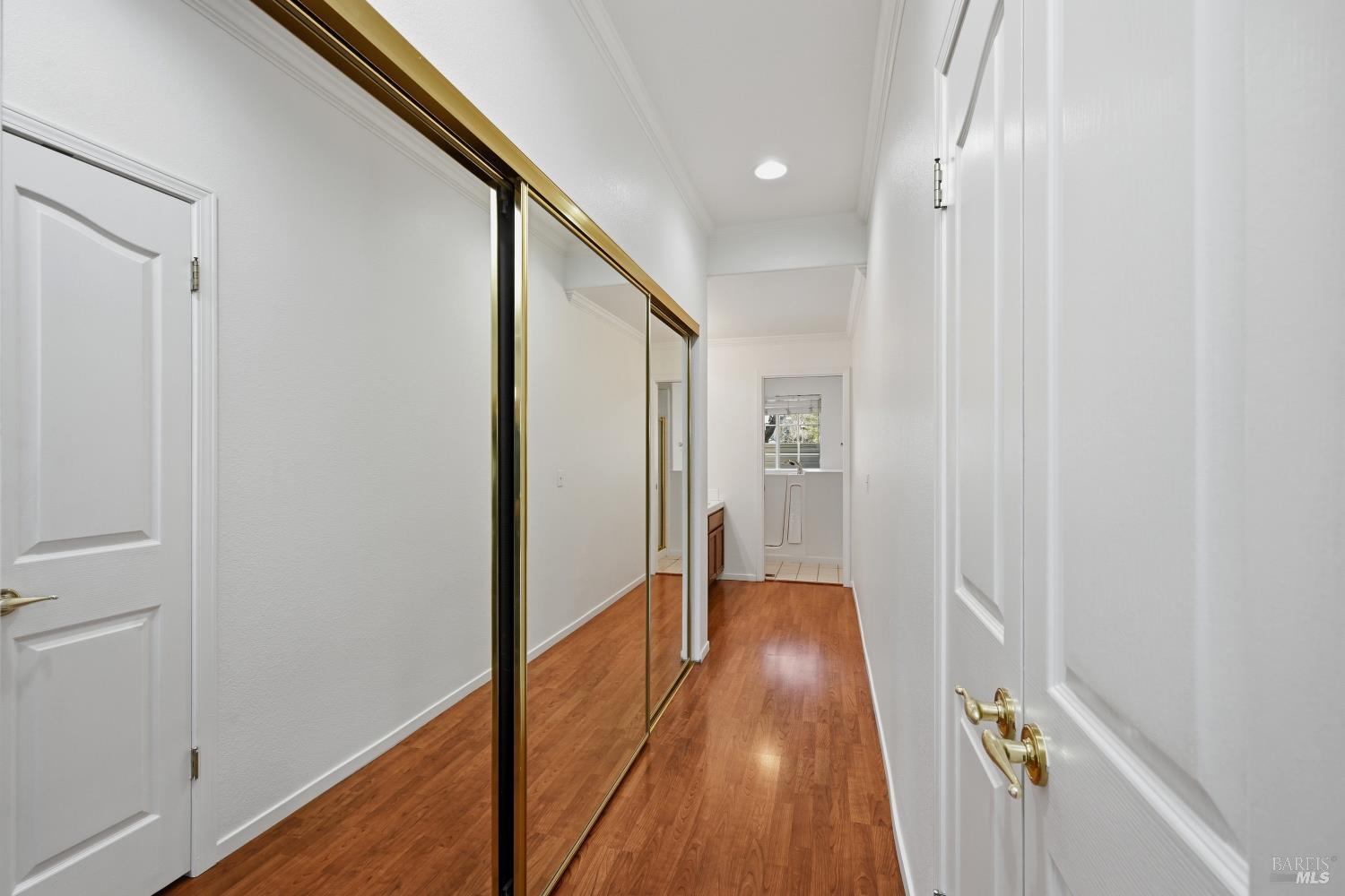 1005 Woodlake Drive Santa Rosa, CA 95405 - Photo 13 of 28 a view of a hallway with wooden floor