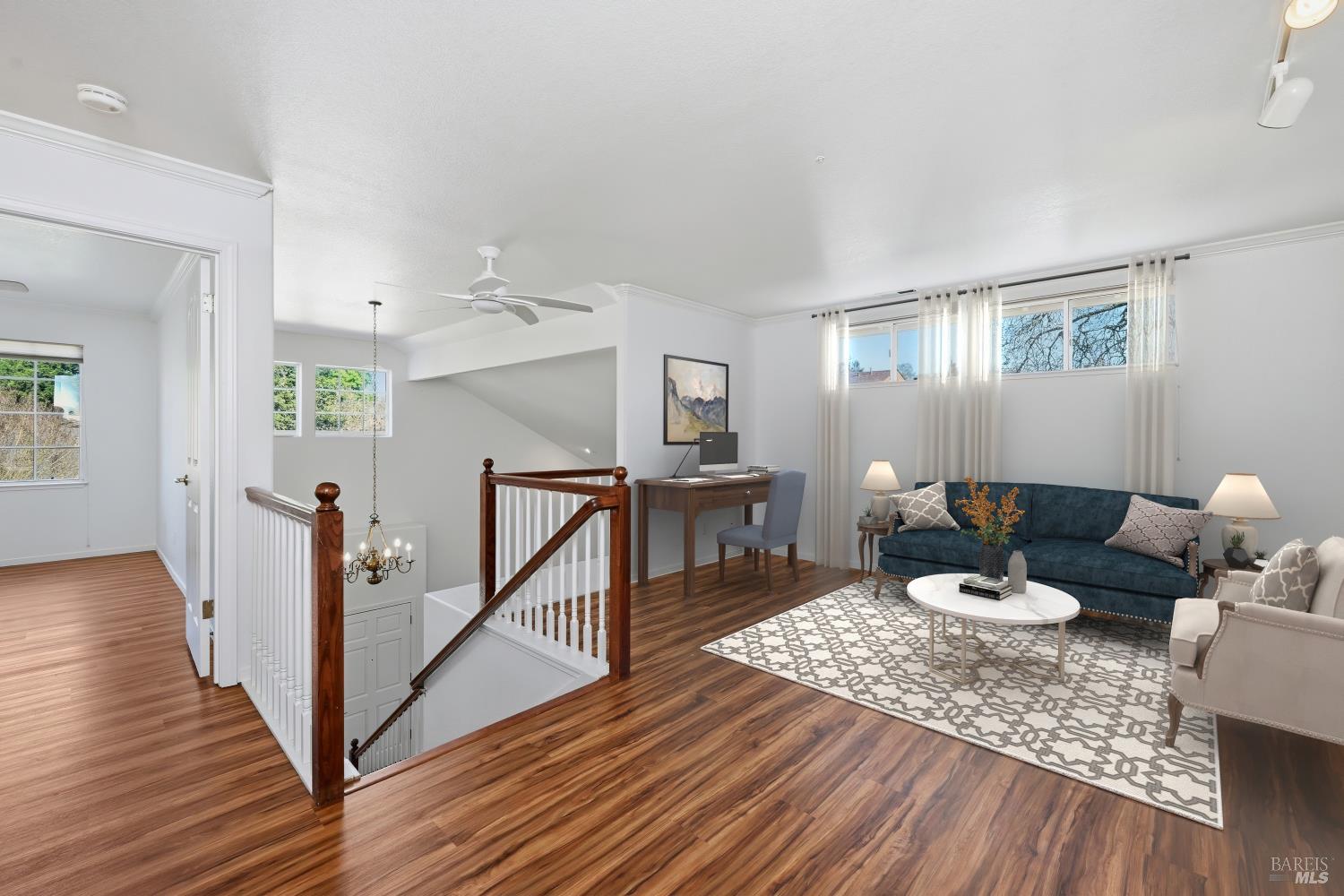 1005 Woodlake Drive Santa Rosa, CA 95405 - Photo 16 of 28 a living room with furniture and wooden floor