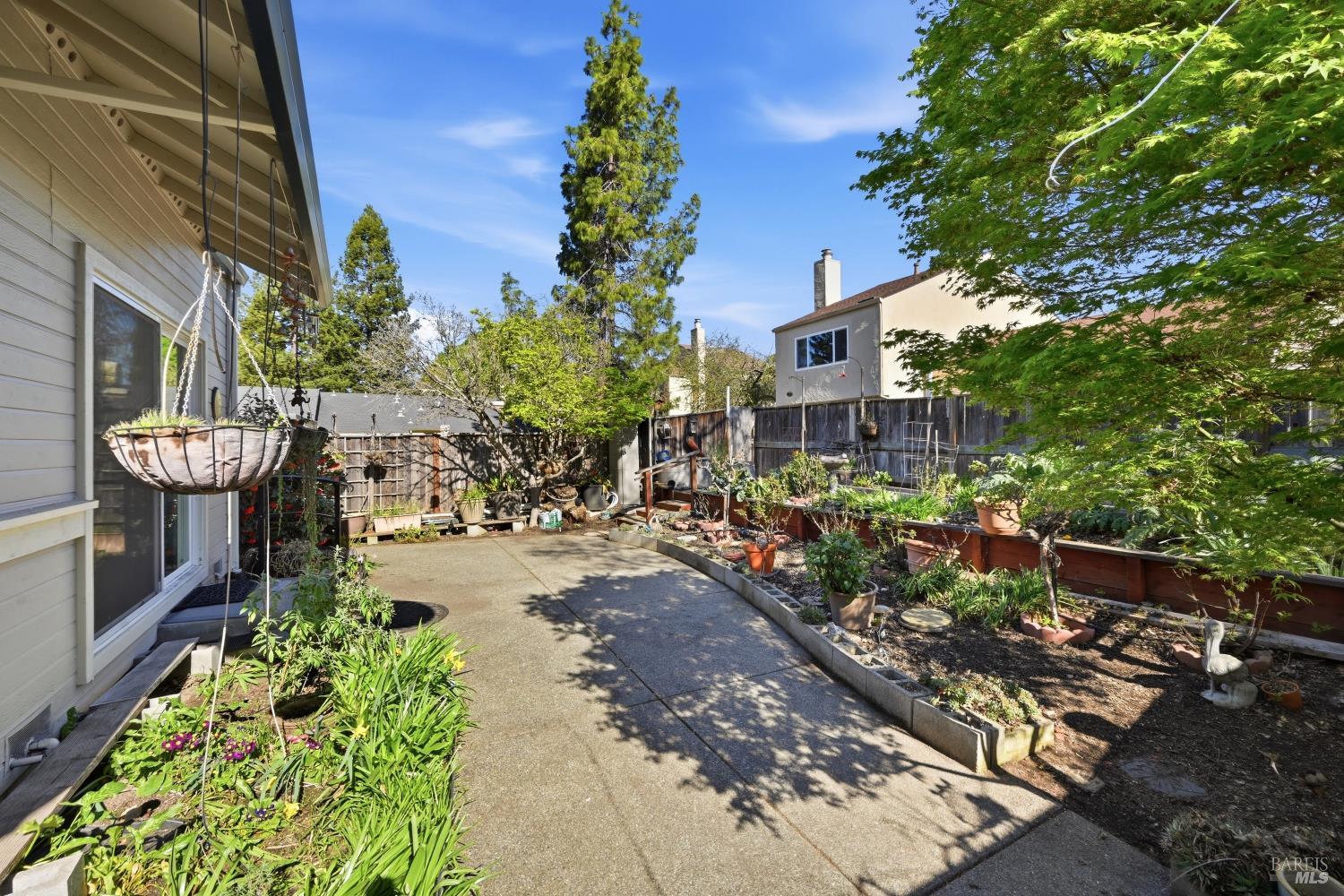 1005 Woodlake Drive Santa Rosa, CA 95405 - Photo 23 of 28 a view of a chairs and table in the patio