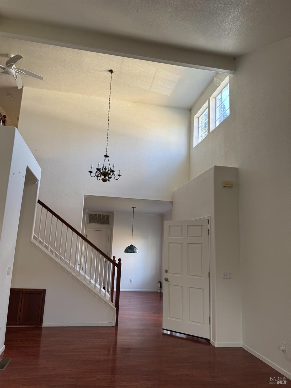 1005 Woodlake Drive Santa Rosa, CA 95405 - Photo 28 of 28 a view of a hallway with entryway and wooden floor