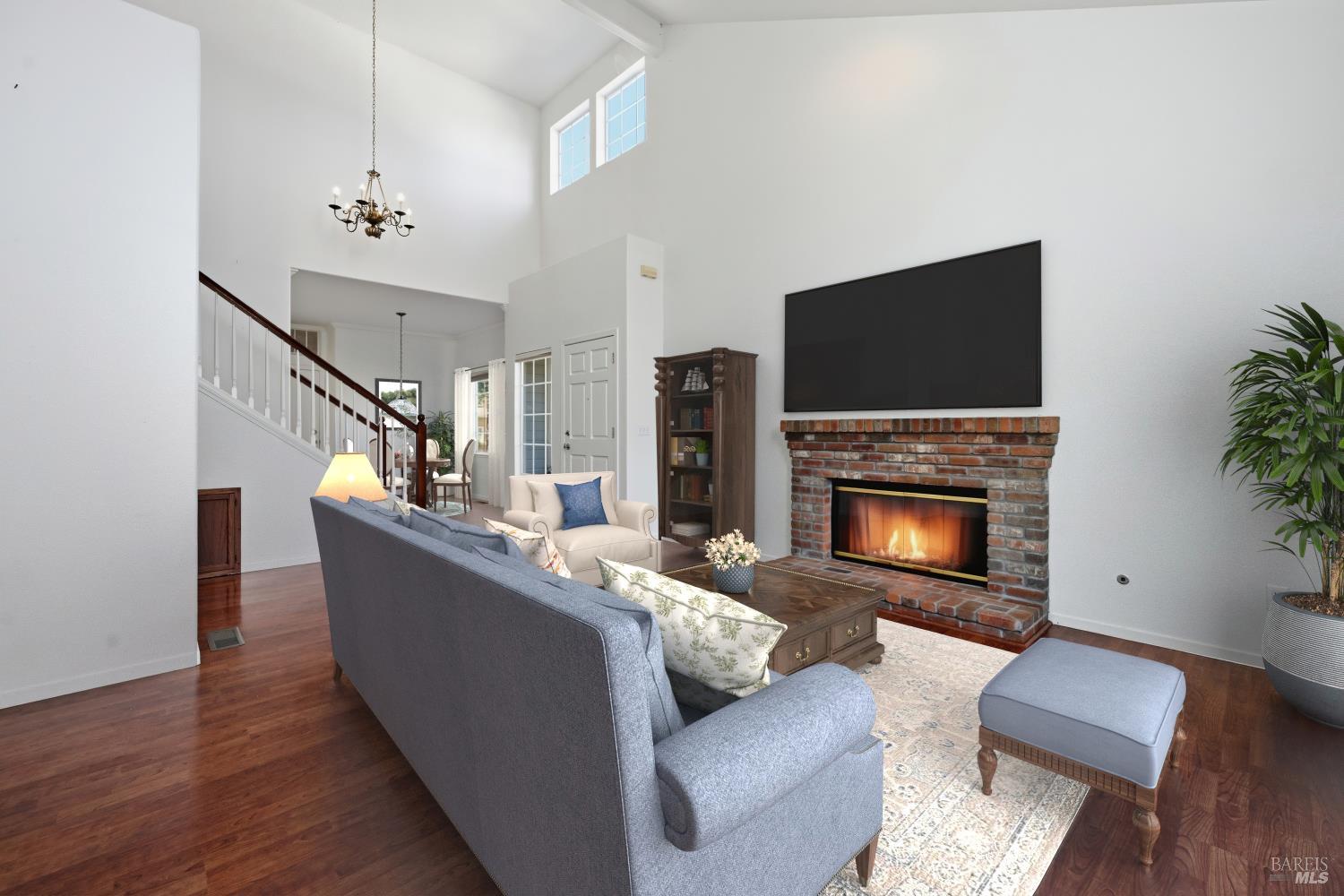 1005 Woodlake Drive Santa Rosa, CA 95405 - Photo 5 of 28 a living room with furniture fireplace and a flat screen tv