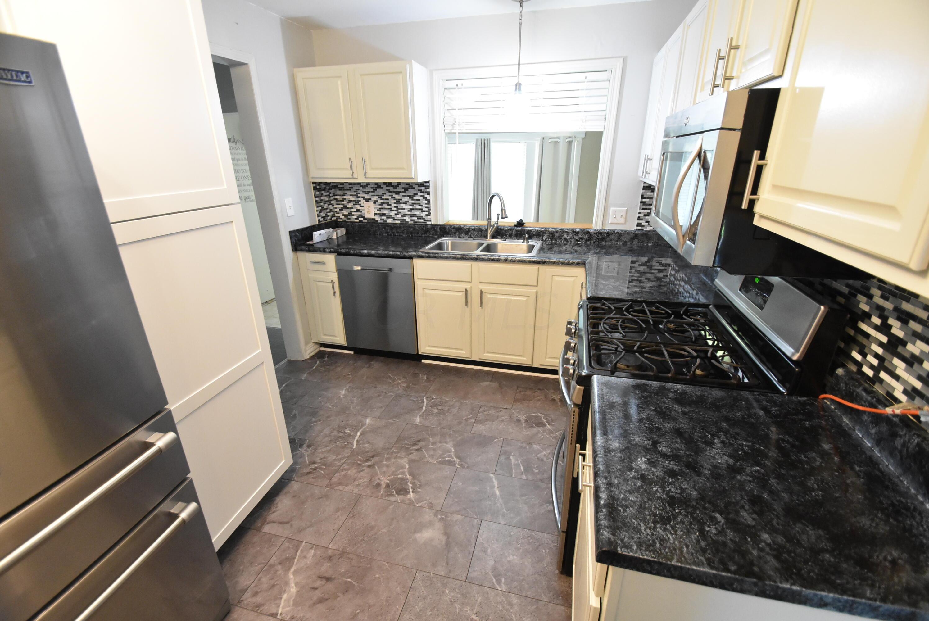 6658 Red Fox Road Reynoldsburg, OH 43068 - Photo 14 of 46 Well Equipped Galley Kitchen Views