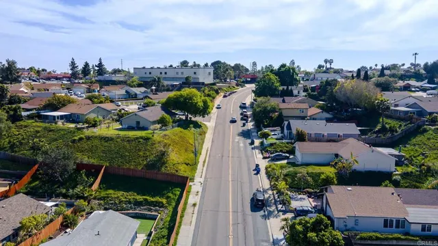 an aerial view of a houses with outdoor space