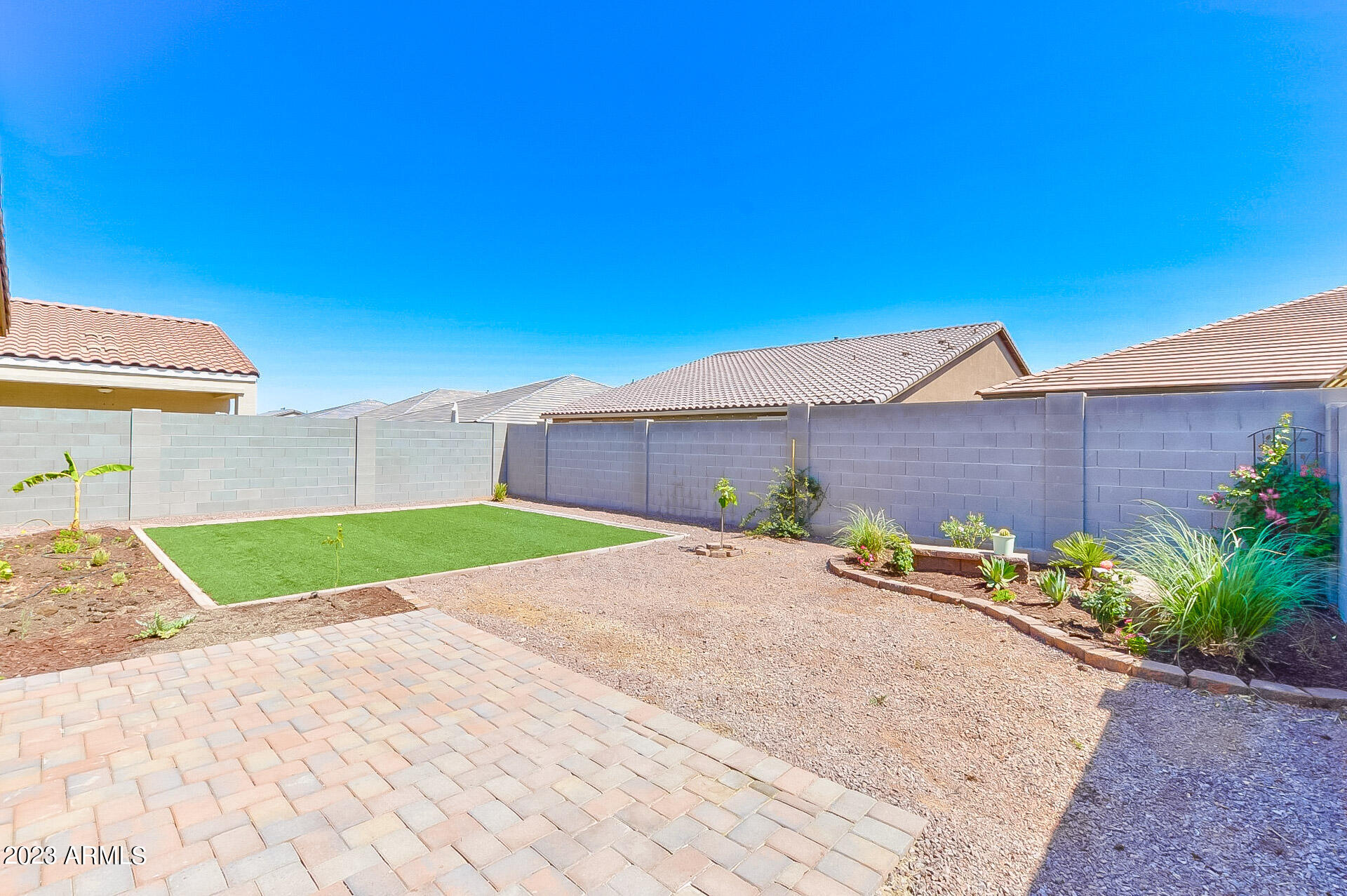21427 West Granada Road Buckeye, AZ 85396 - Photo 12 of 16 Easy Care Artificial Turf!