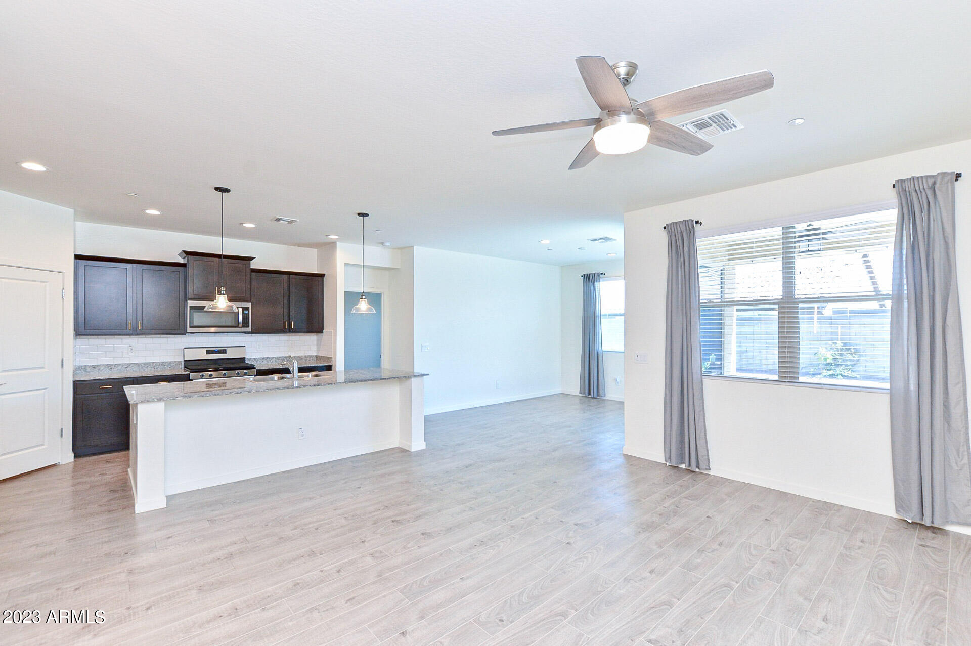 21427 West Granada Road Buckeye, AZ 85396 - Photo 4 of 16 Large Family Room