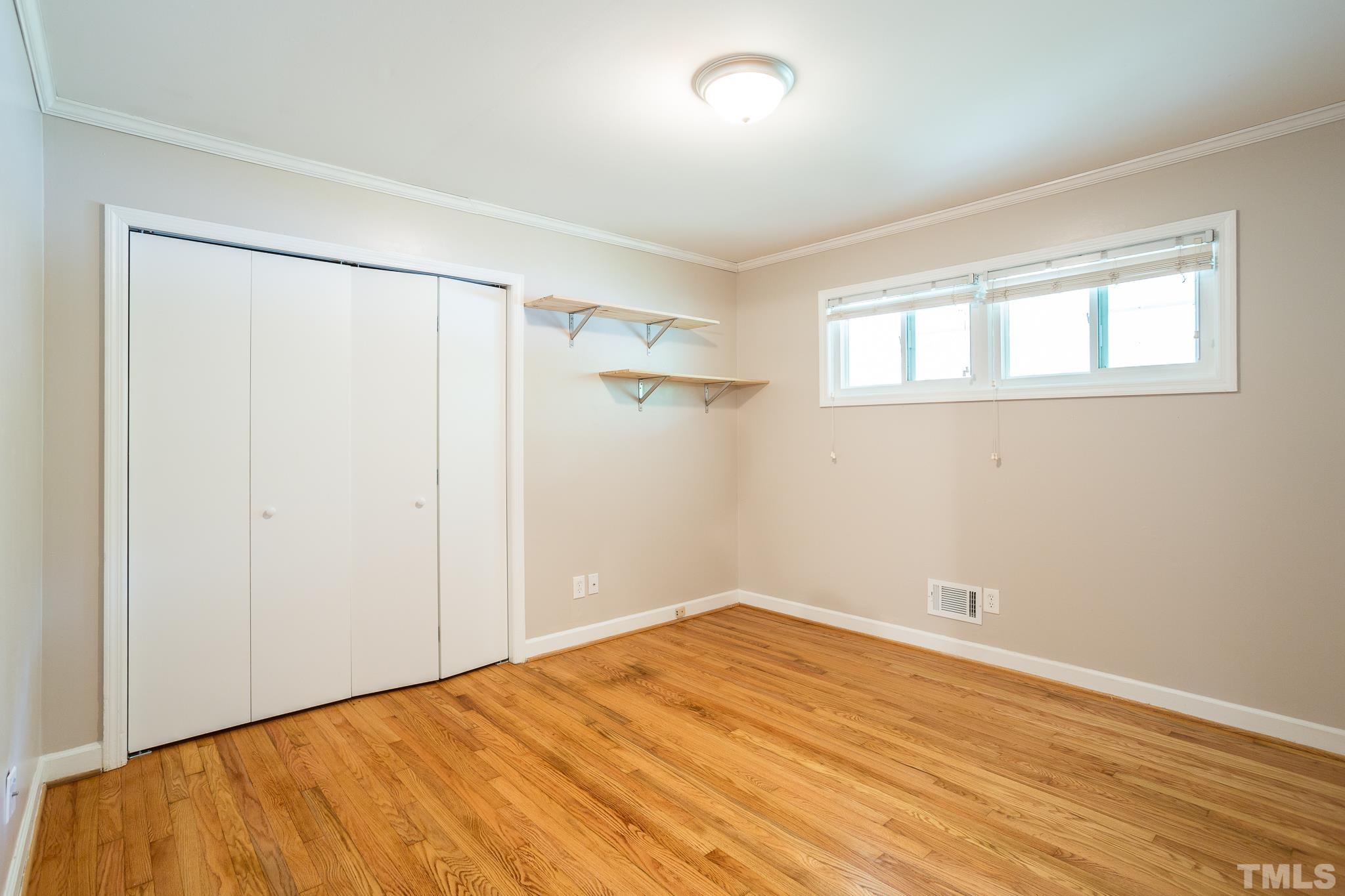 3620 Marsh Creek Road Raleigh, NC 27604 - Photo 14 of 25 a view of empty room with wooden floor