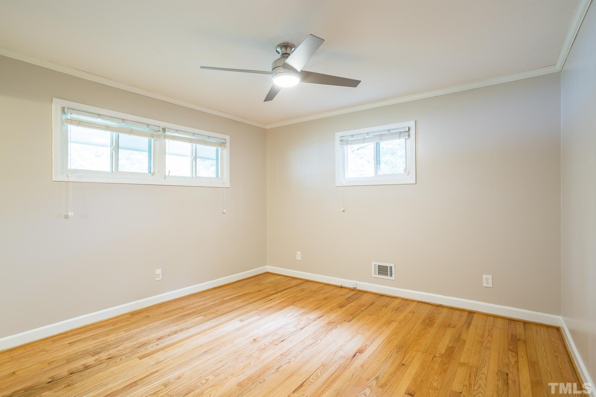 3620 Marsh Creek Road Raleigh, NC 27604 - Photo 16 of 25 a view of empty room with wooden floor