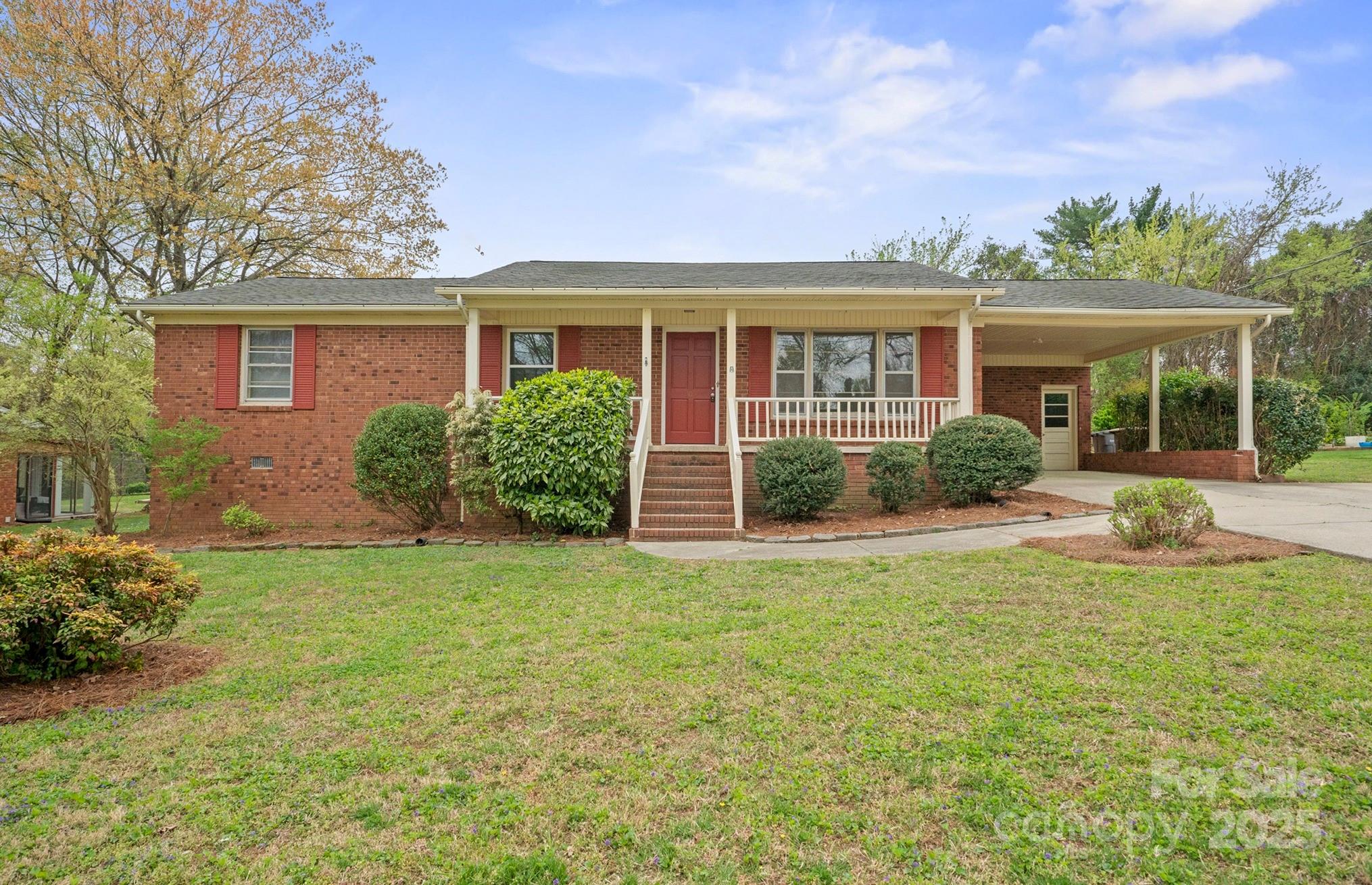 front view of a house with a yard