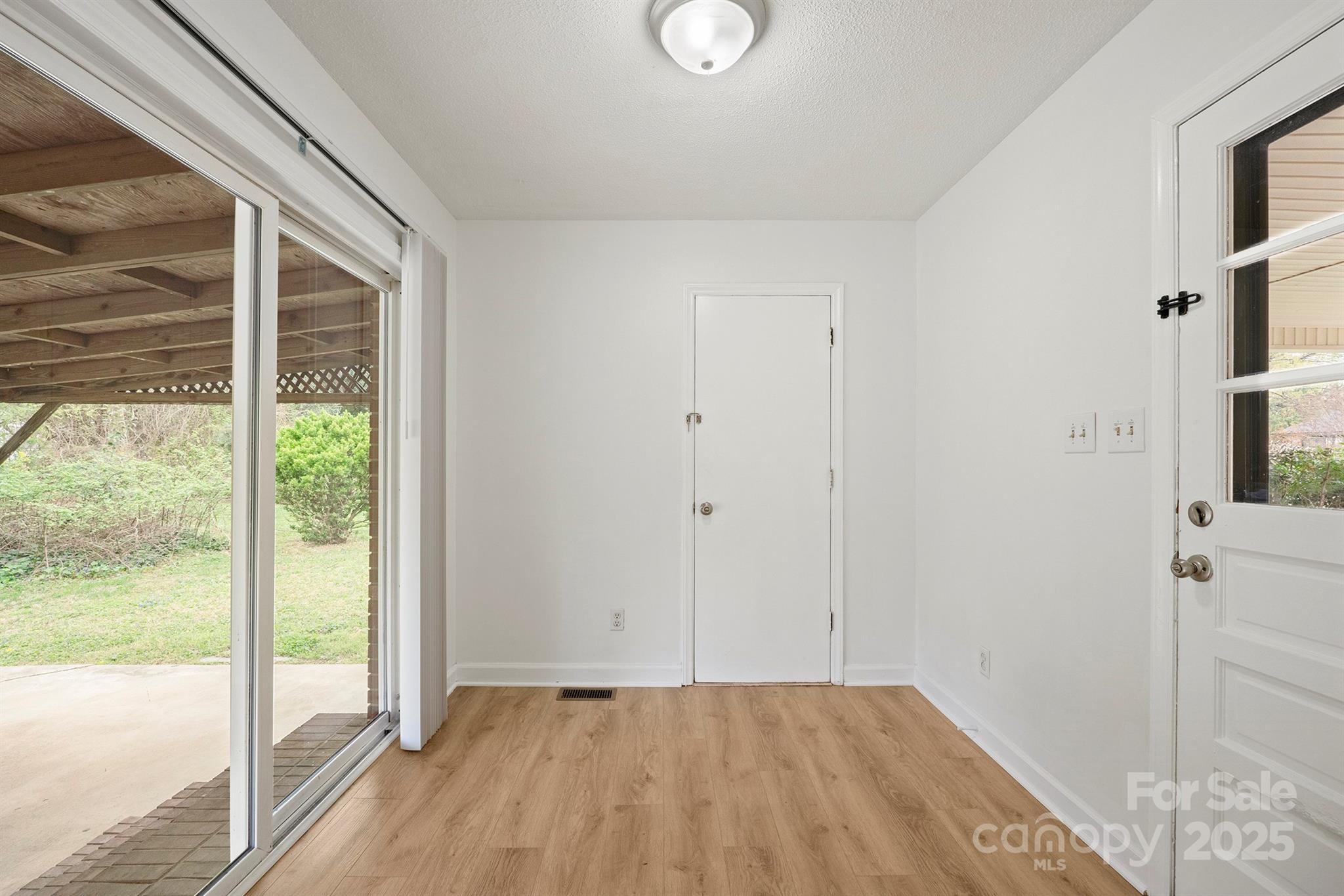 303 Windy Rush Road Kannapolis, NC 28081 - Photo 17 of 30 a view of an empty room and window