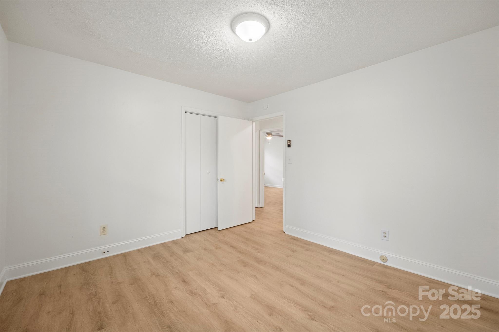 303 Windy Rush Road Kannapolis, NC 28081 - Photo 25 of 30 a view of an empty room