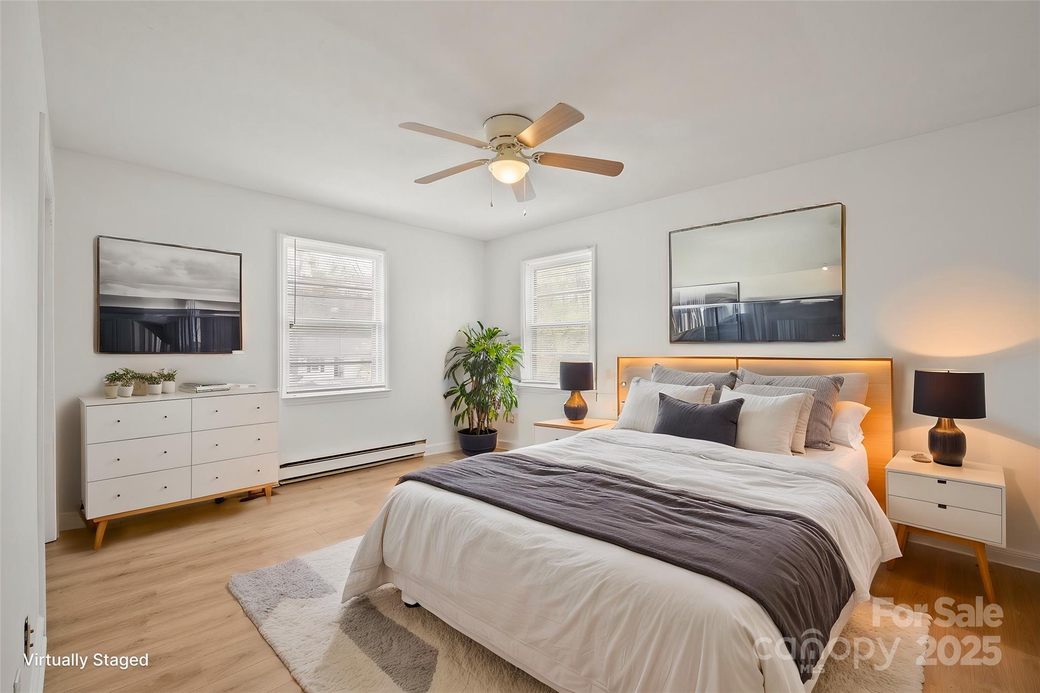 303 Windy Rush Road Kannapolis, NC 28081 - Photo 6 of 30 a bedroom with a large bed and a window