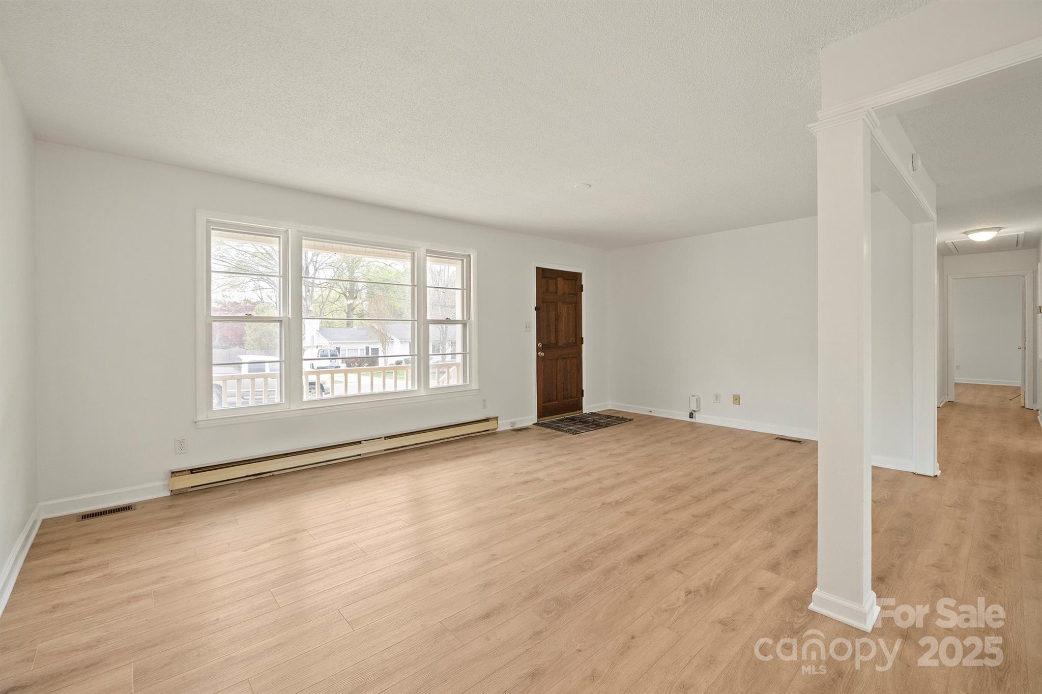 303 Windy Rush Road Kannapolis, NC 28081 - Photo 10 of 30 a view of an empty room with a window