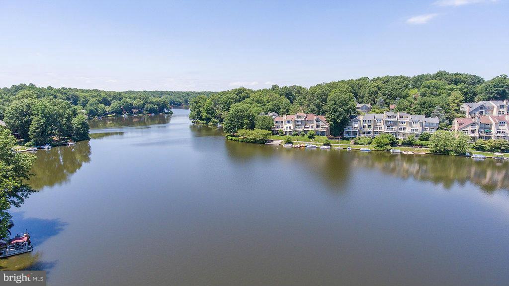 11002 Thrush Ridge Road Reston, VA 20191 - Photo 1 of 29 a view of a lake with houses