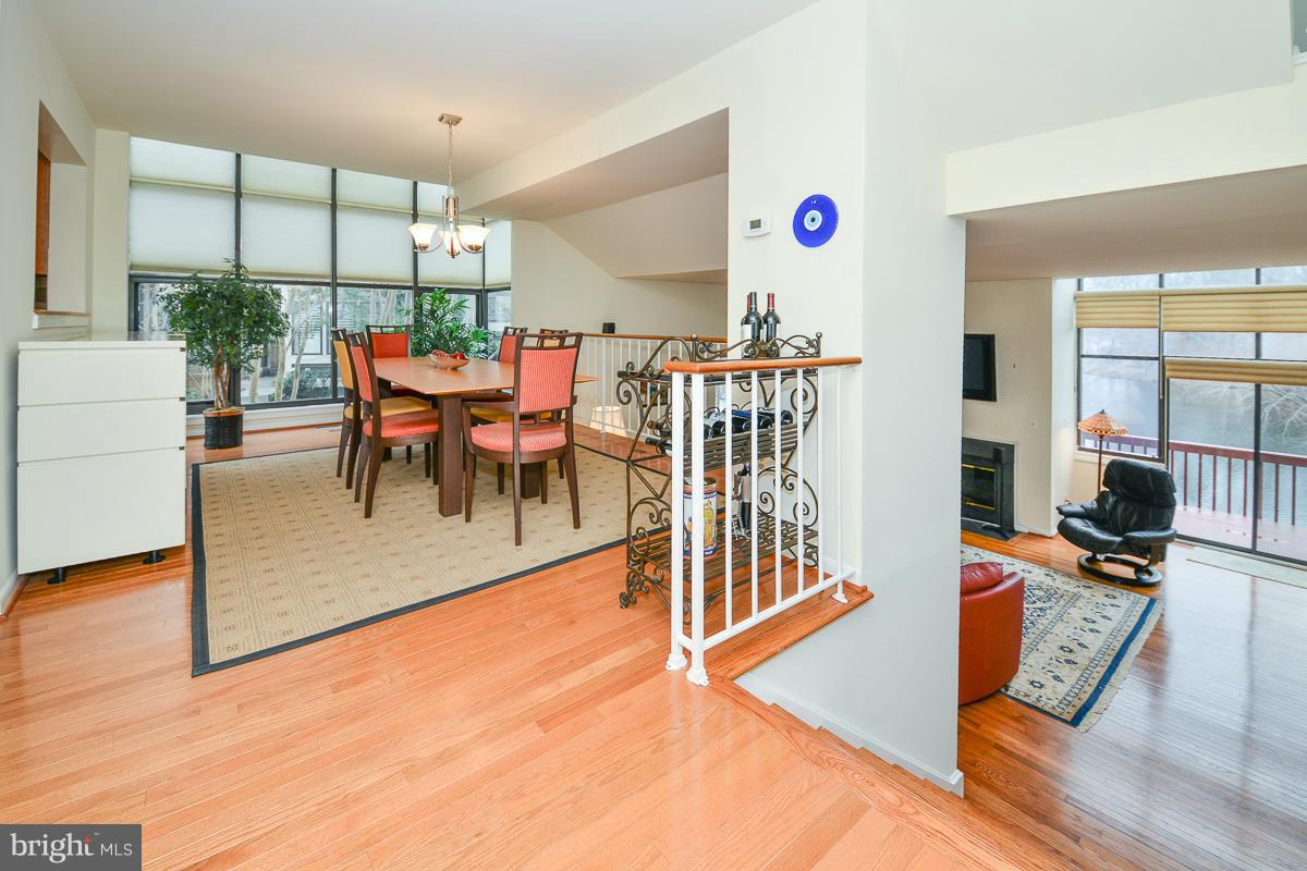 11002 Thrush Ridge Road Reston, VA 20191 - Photo 14 of 29 a living room with furniture a rug and a large window