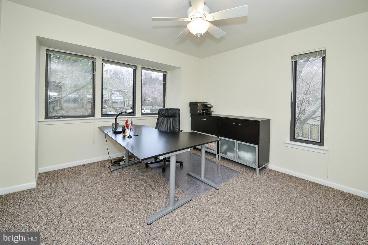11002 Thrush Ridge Road Reston, VA 20191 - Photo 22 of 29 a view of a workspace with furniture and a window