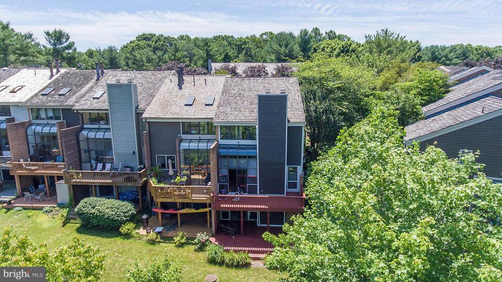 11002 Thrush Ridge Road Reston, VA 20191 - Photo 4 of 29 an aerial view of a house with outdoor space and sitting area