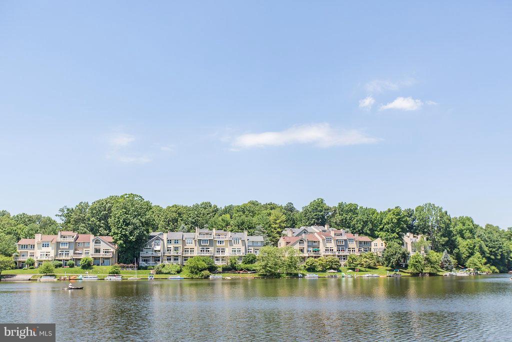 11002 Thrush Ridge Road Reston, VA 20191 - Photo 5 of 29 a view of a lake with houses