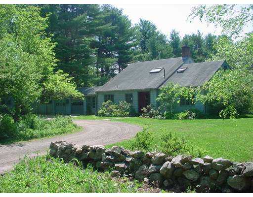 7 Depot Road Boxford, MA 01921 - Photo 1 of 3 a view of a house with a yard and a large tree