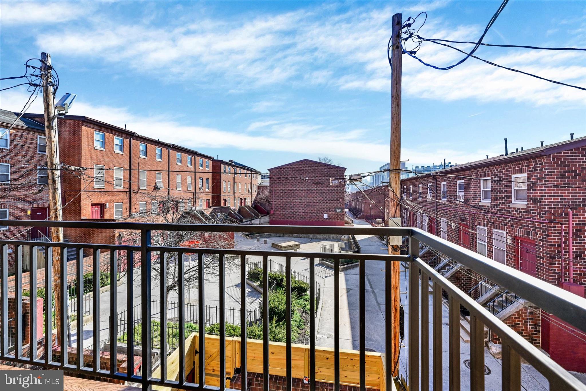 119 North Poppleton Street Baltimore, MD 21201 - Photo 12 of 41 a city view from a balcony