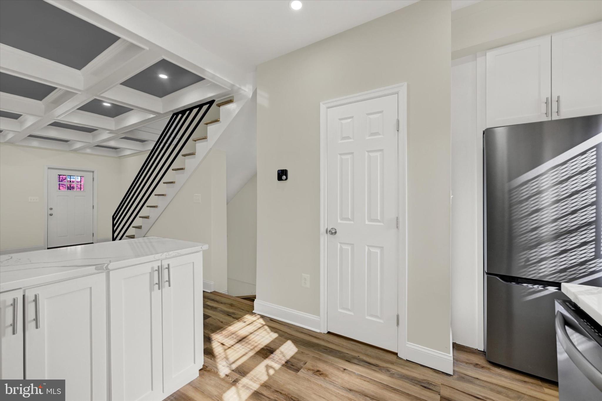119 North Poppleton Street Baltimore, MD 21201 - Photo 15 of 41 a view of an entryway with wooden floor