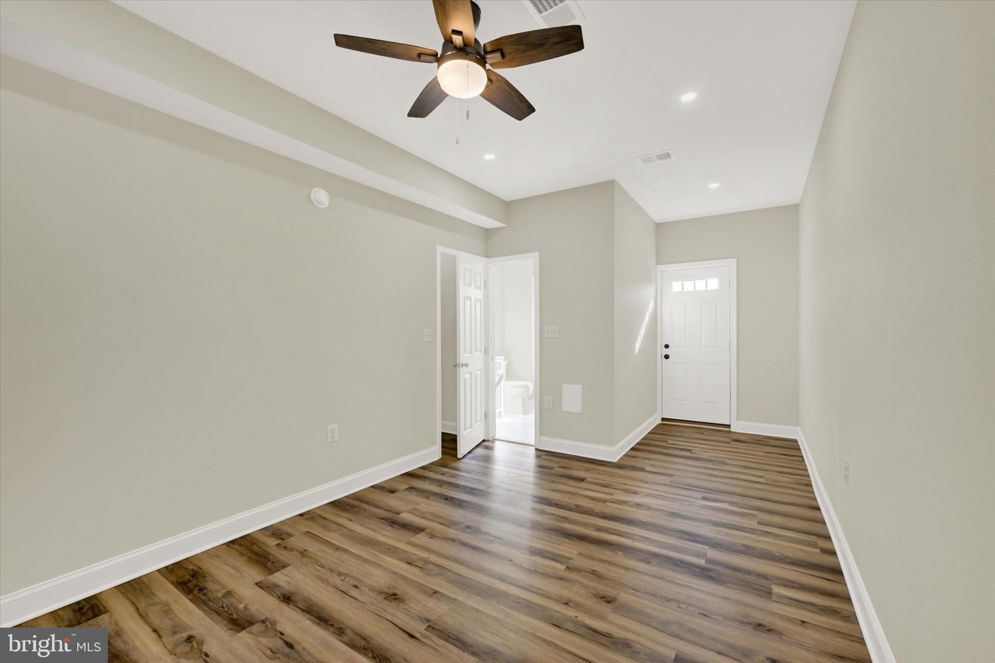 119 North Poppleton Street Baltimore, MD 21201 - Photo 22 of 41 wooden floor in an empty room