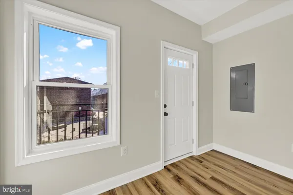 a view of a room that has a window in it