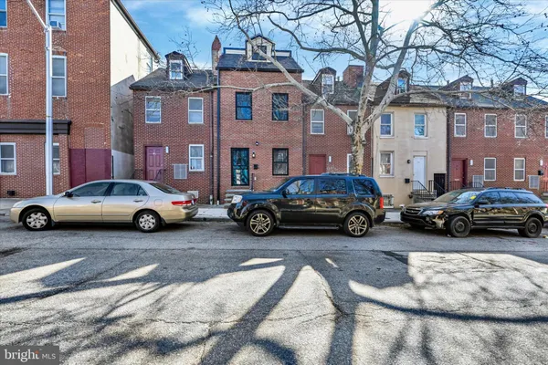 a car parked in front of a building