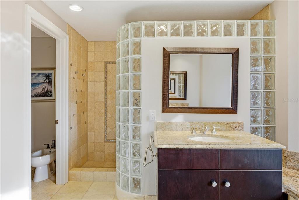 761 Norton Street Longboat Key, FL 34228 - Photo 27 of 66 a bathroom with a sink and a mirror