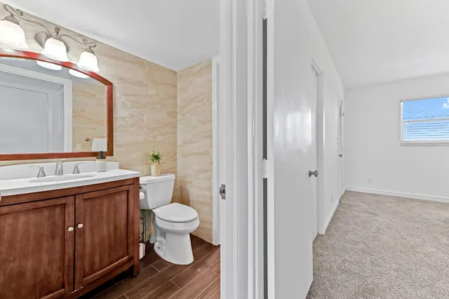 a bathroom with a sink and toilet