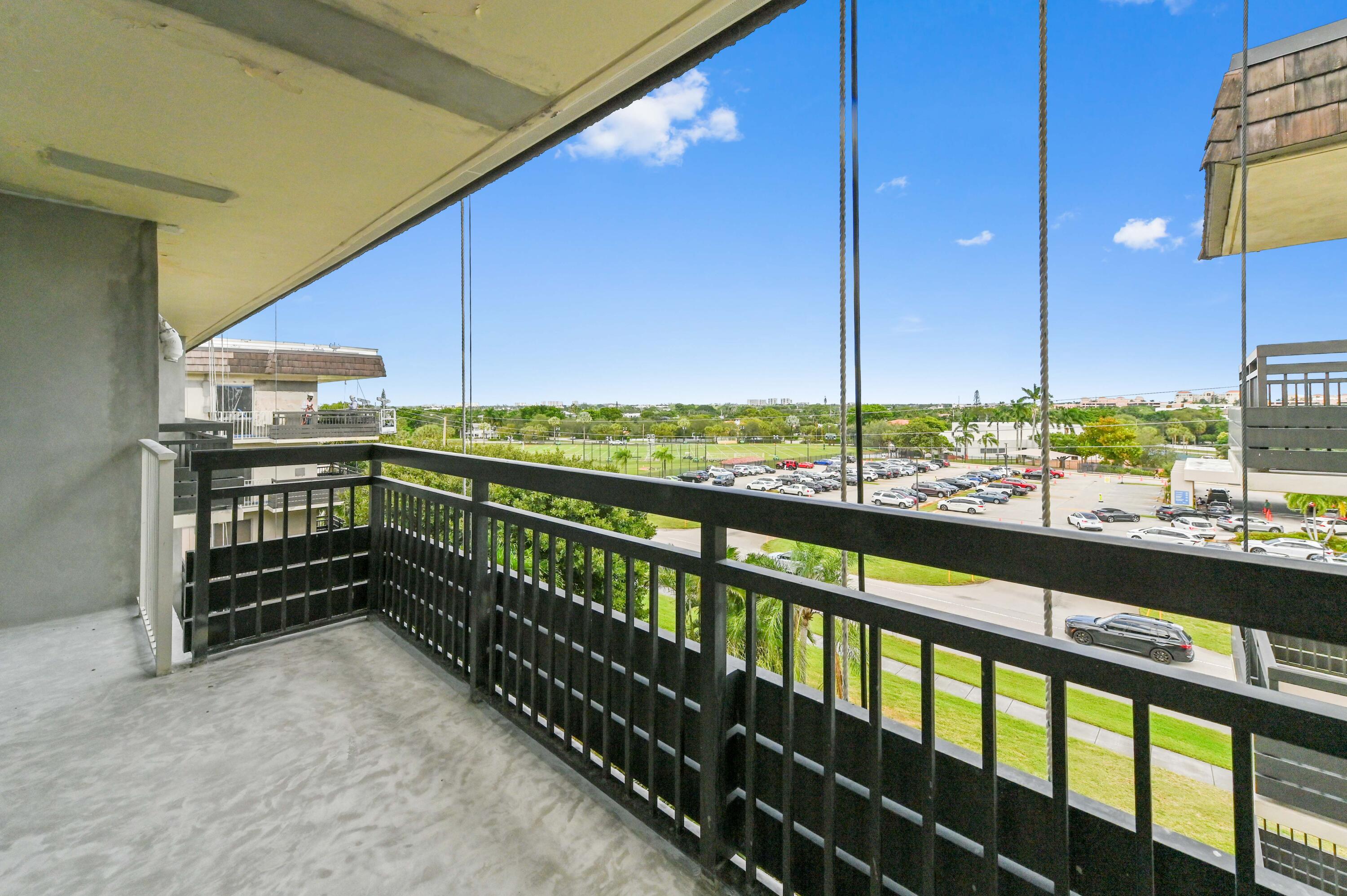 555 Northwest 4th Avenue, Unit 5070 Boca Raton, FL 33432 - Photo 18 of 29 a view of city from balcony