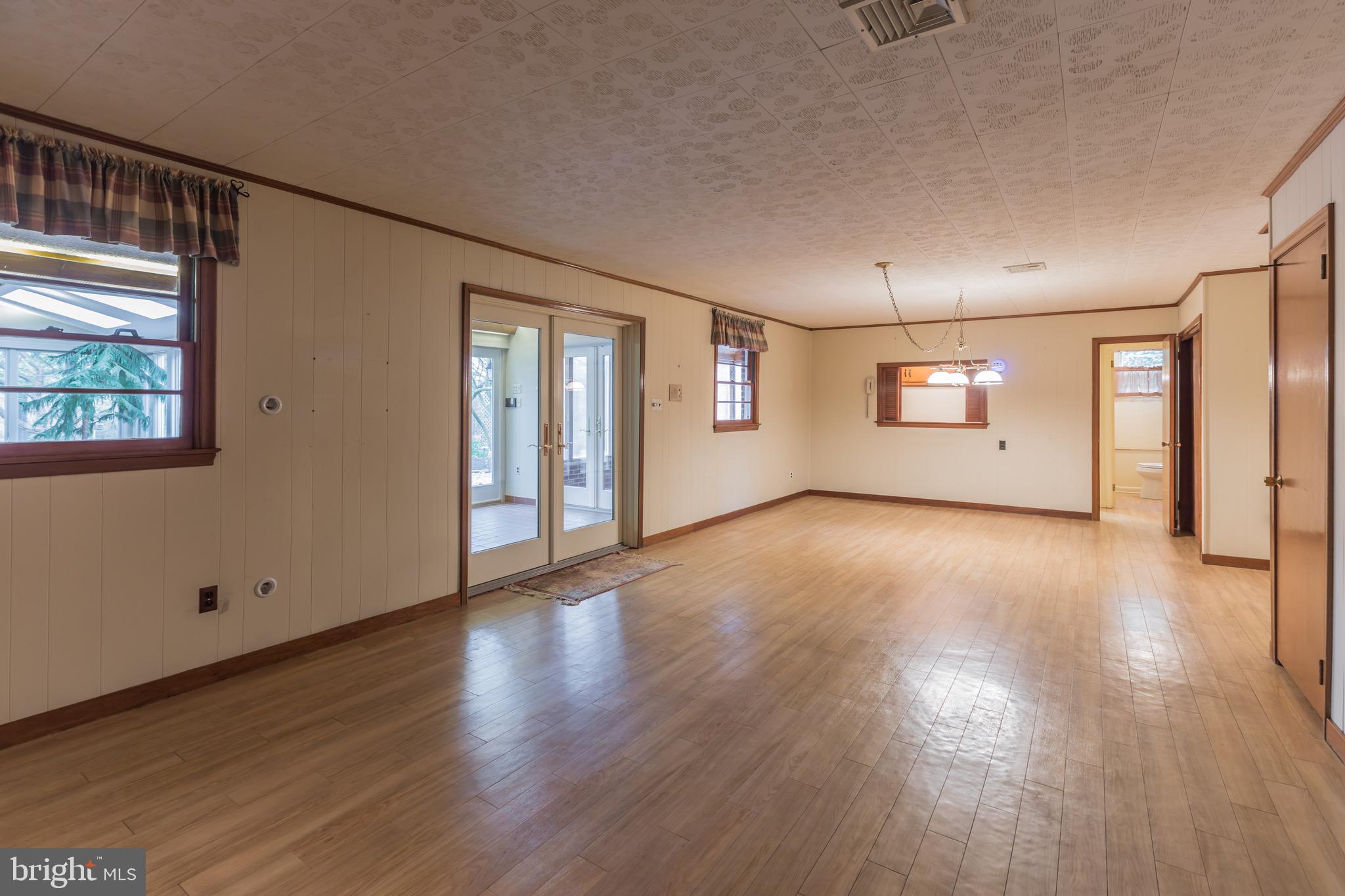 2931 Eagleville Road Eagleville, PA 19403 - Photo 19 of 46 Great Room with French Doors to Solarium.