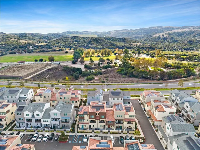 an aerial view of residential building with outdoor space