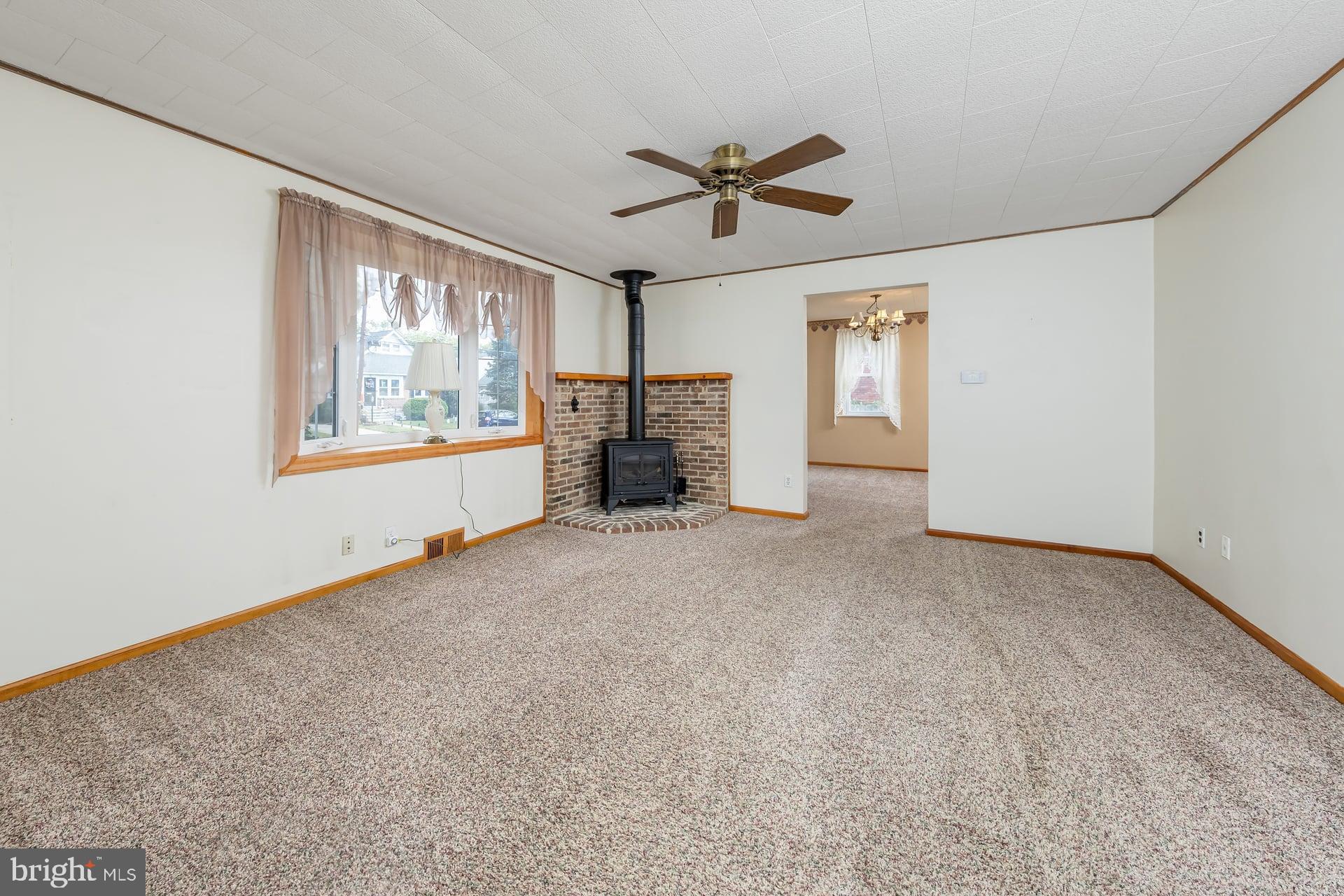 2008 Sycamore Street Haddon Heights, NJ 08035 - Photo 3 of 17 a view of a livingroom with a ceiling fan and window