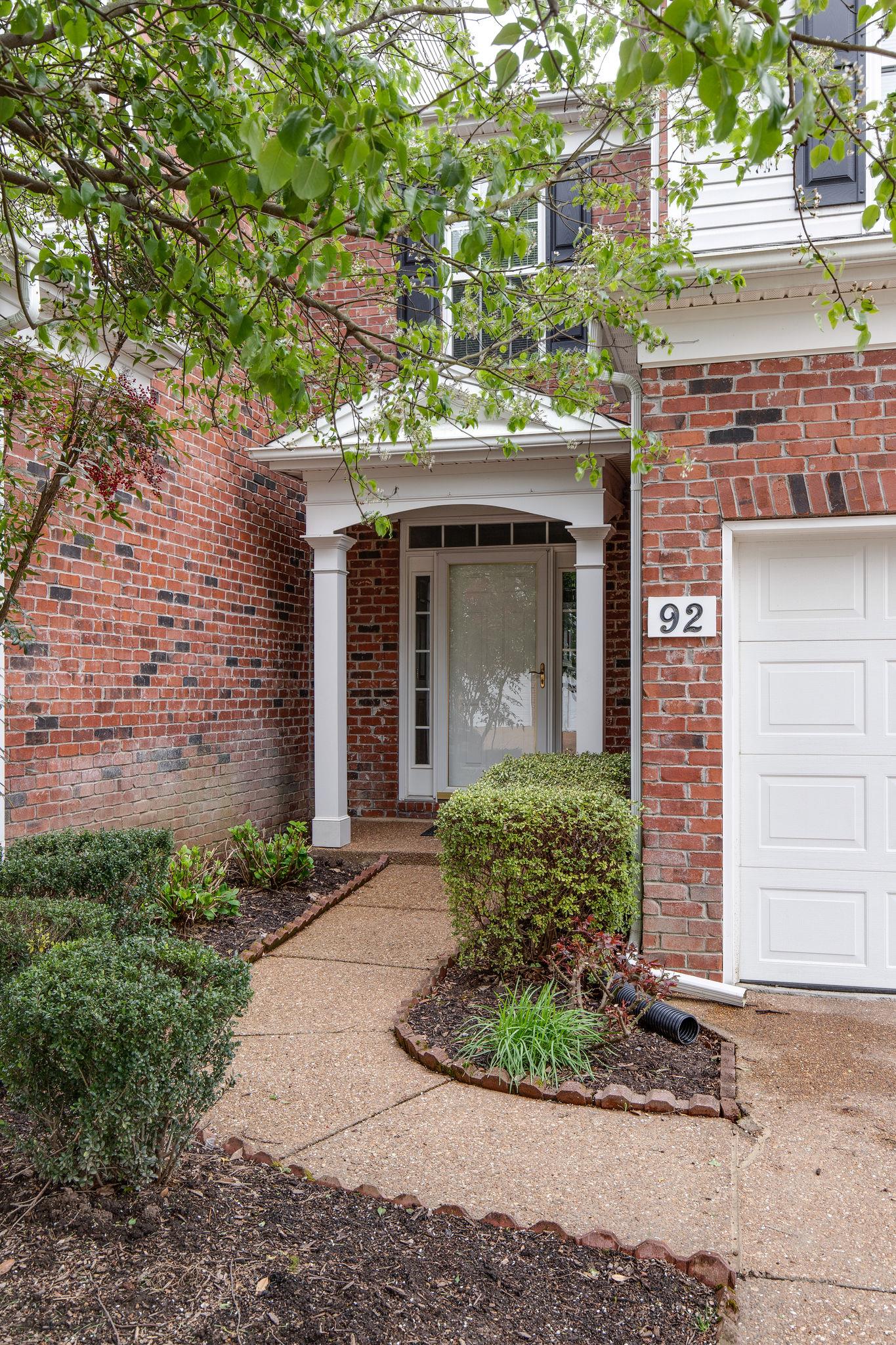 231 Green Harbor Road, Unit 92 Old Hickory, TN 37138 - Photo 3 of 30 a front view of a house with garden