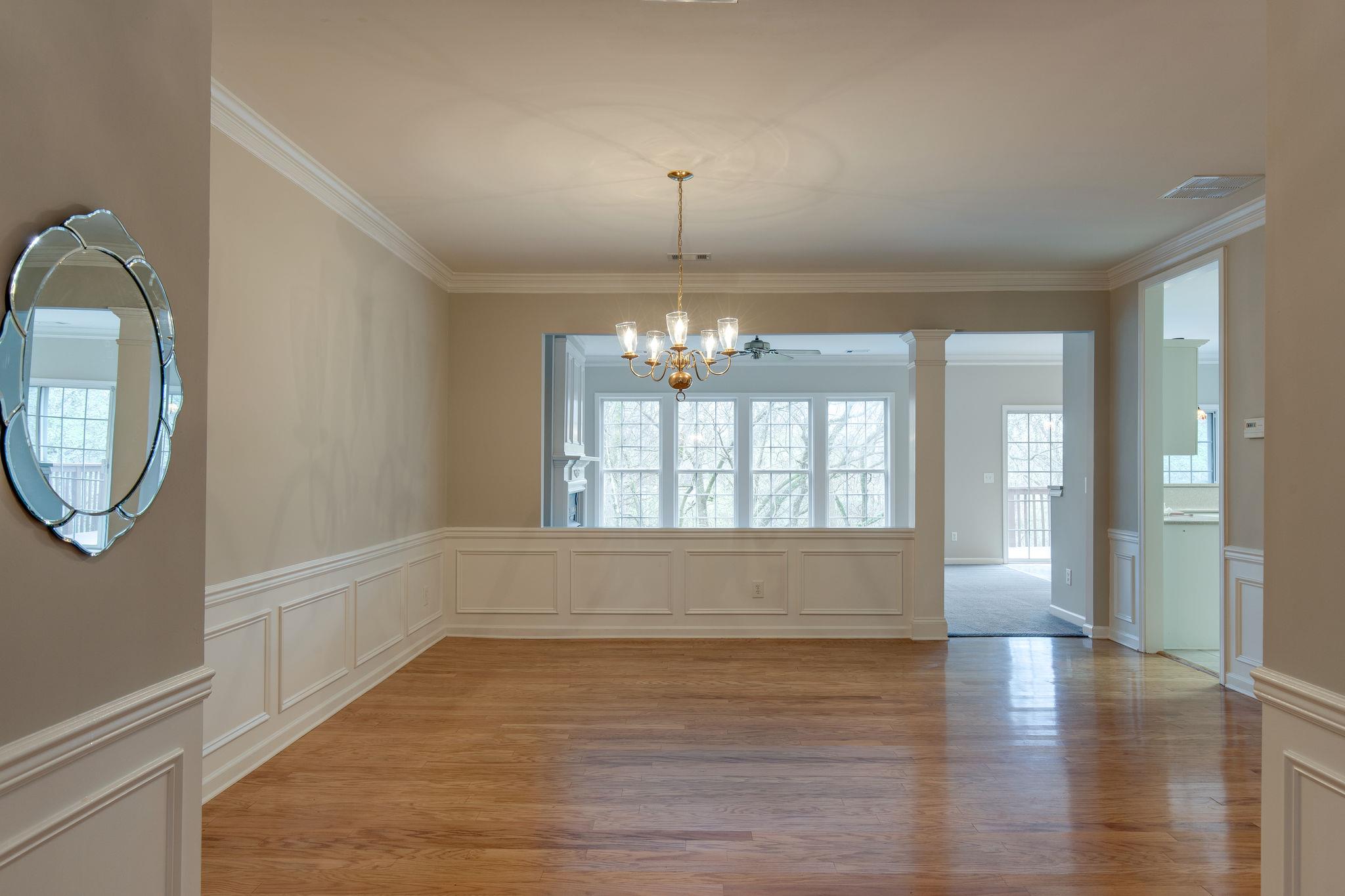 231 Green Harbor Road, Unit 92 Old Hickory, TN 37138 - Photo 4 of 30 a view of an empty room with wooden floor and a window
