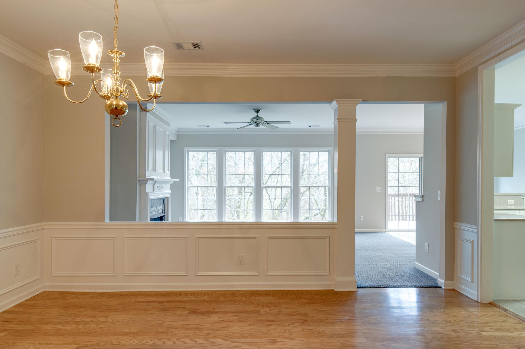 231 Green Harbor Road, Unit 92 Old Hickory, TN 37138 - Photo 6 of 30 a view of an empty room with wooden floor and a window
