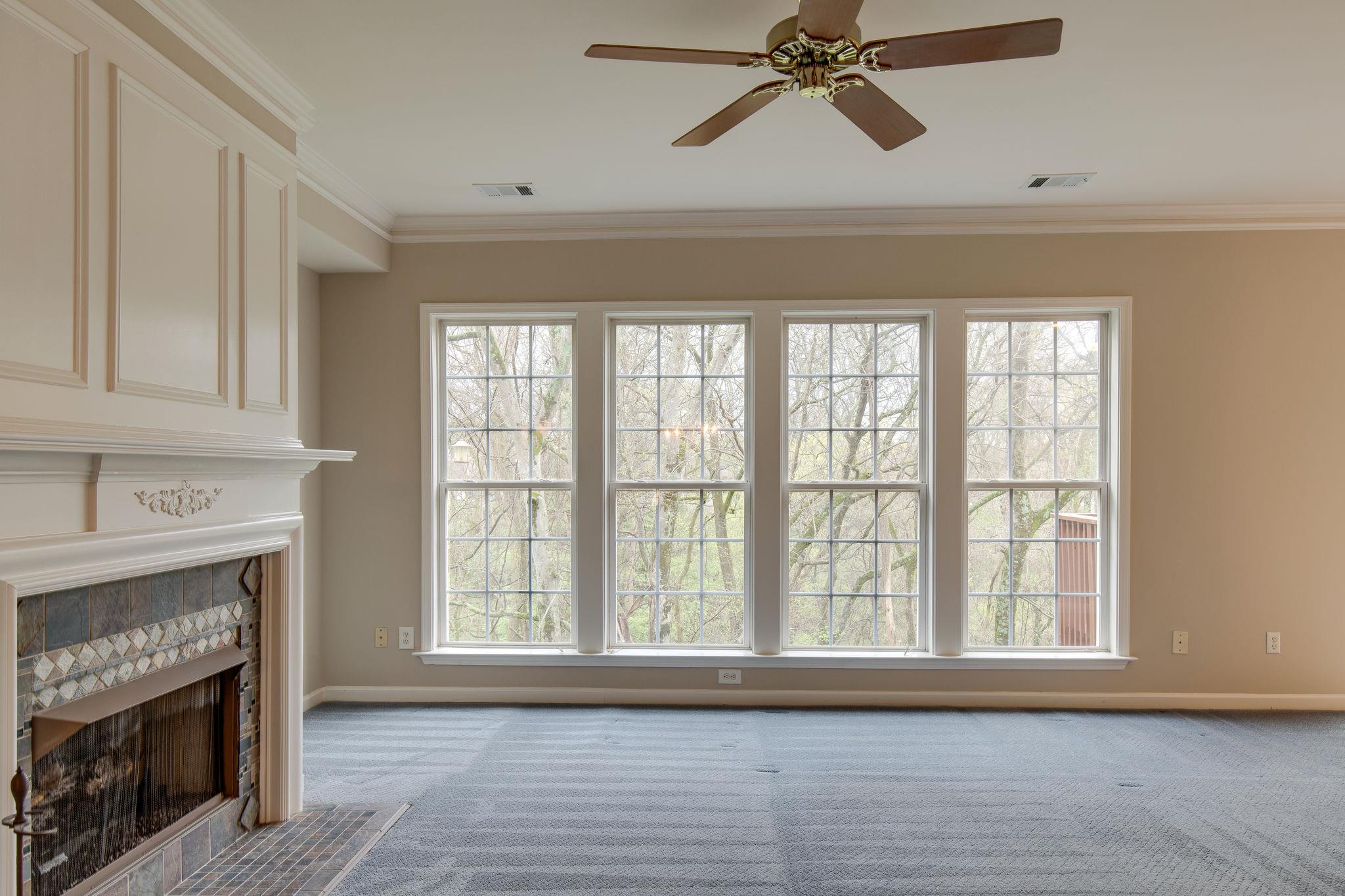 231 Green Harbor Road, Unit 92 Old Hickory, TN 37138 - Photo 8 of 30 a view of an empty room with a window and fireplace