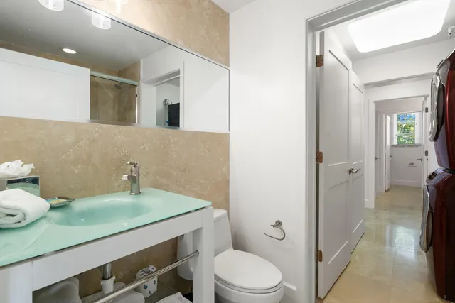 an aerial view of a house with a swimming pool