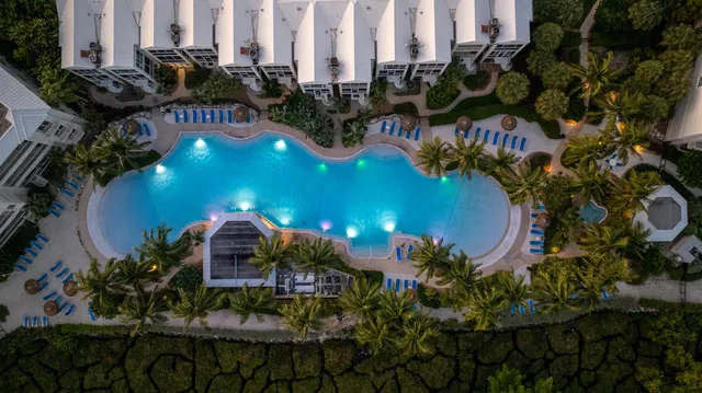 a terrace with outdoor seating and city view