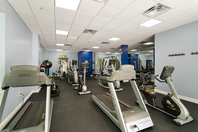 a view of a patio with a dining table and chairs