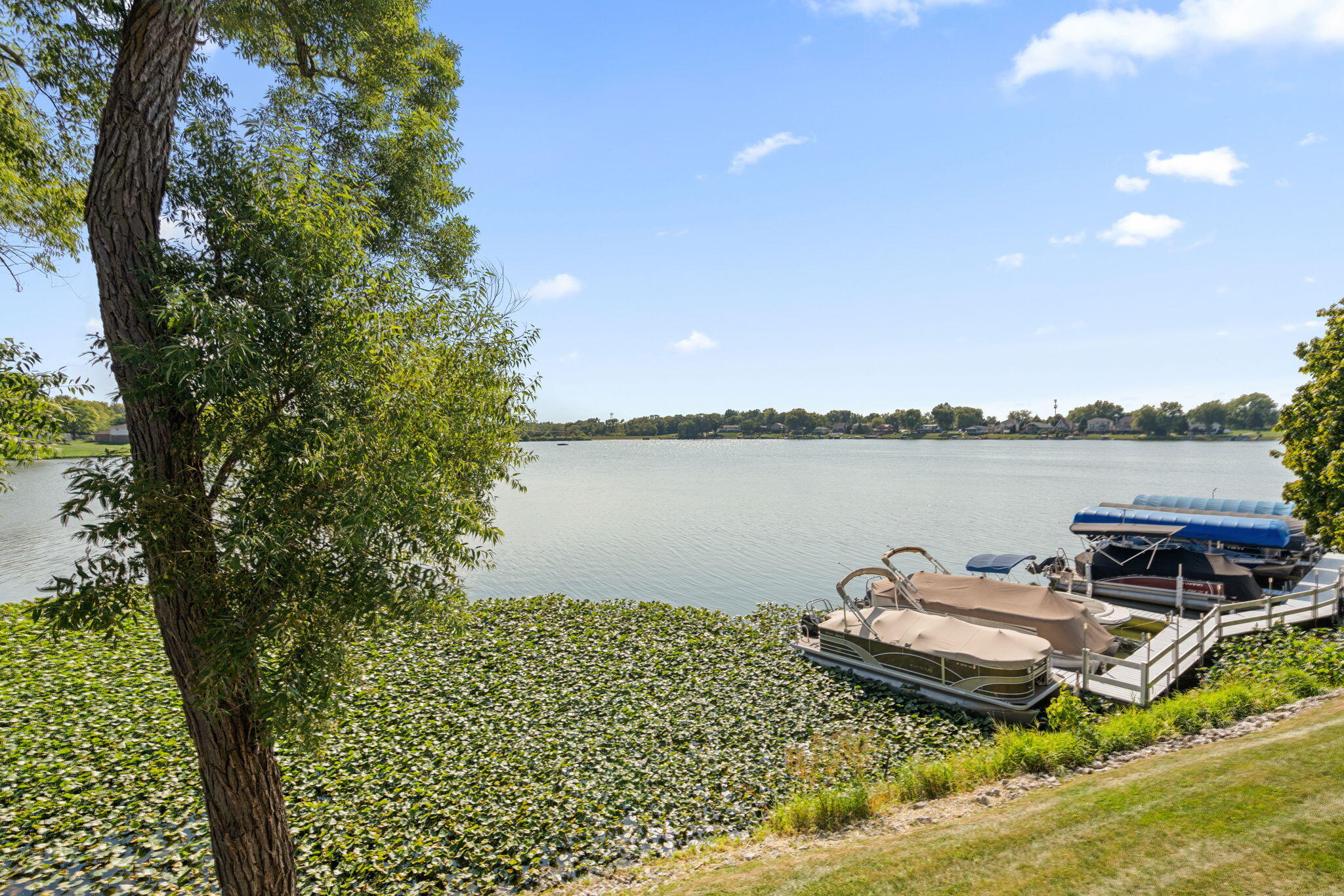 5015 Spinnaker Lane, Unit C Crown Point, IN 46307 - Photo 15 of 24 a view of a lake with a mountain