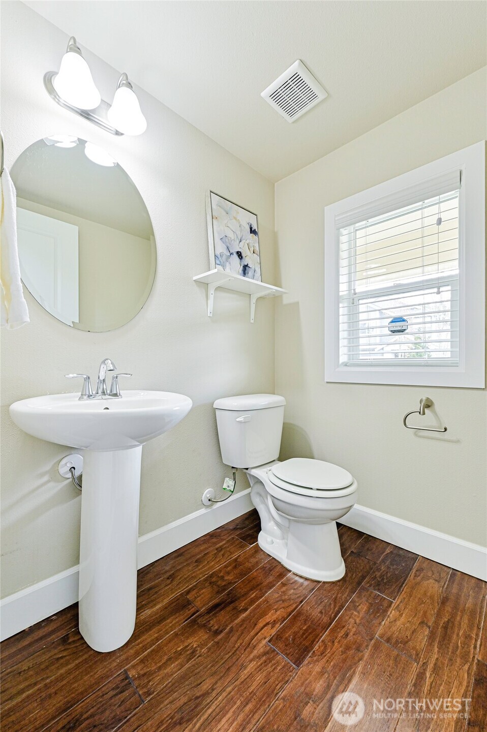 17312 40th Avenue Southeast Bothell, WA 98012 - Photo 14 of 34 a bathroom with a toilet sink and mirror