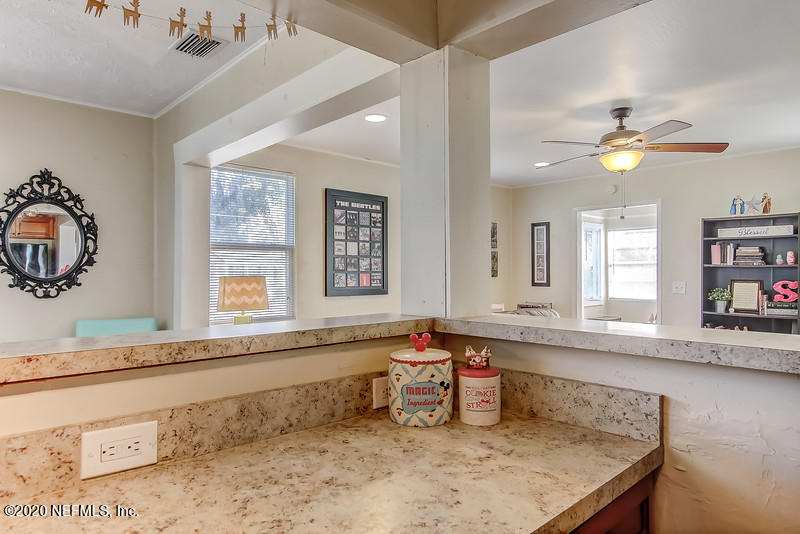 4616 Pinewood Road Jacksonville, FL 32210 - Photo 11 of 26 Open kitchen to living room